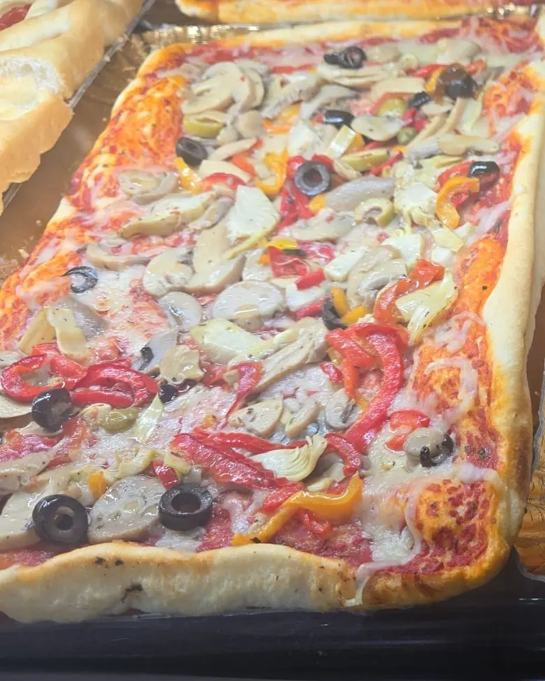 Trancio di pizza capricciosa